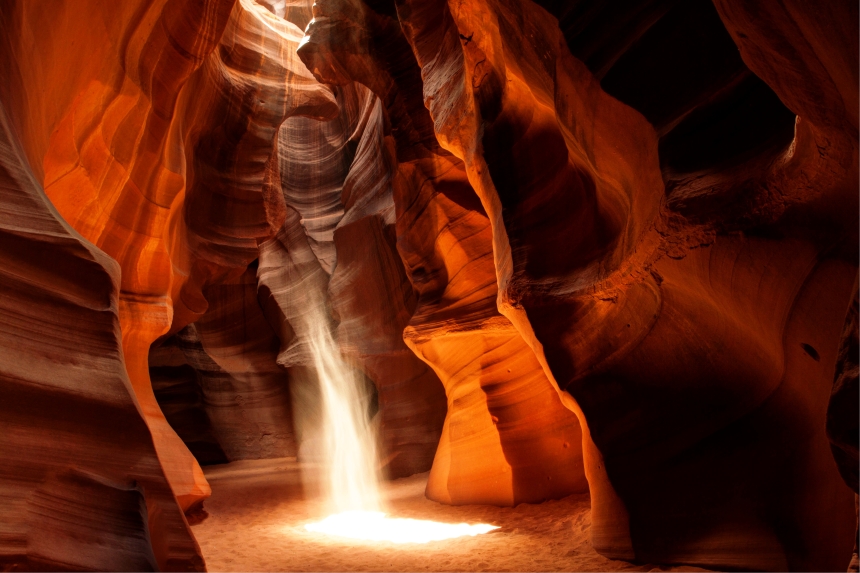 antelope canyon light beam with sand